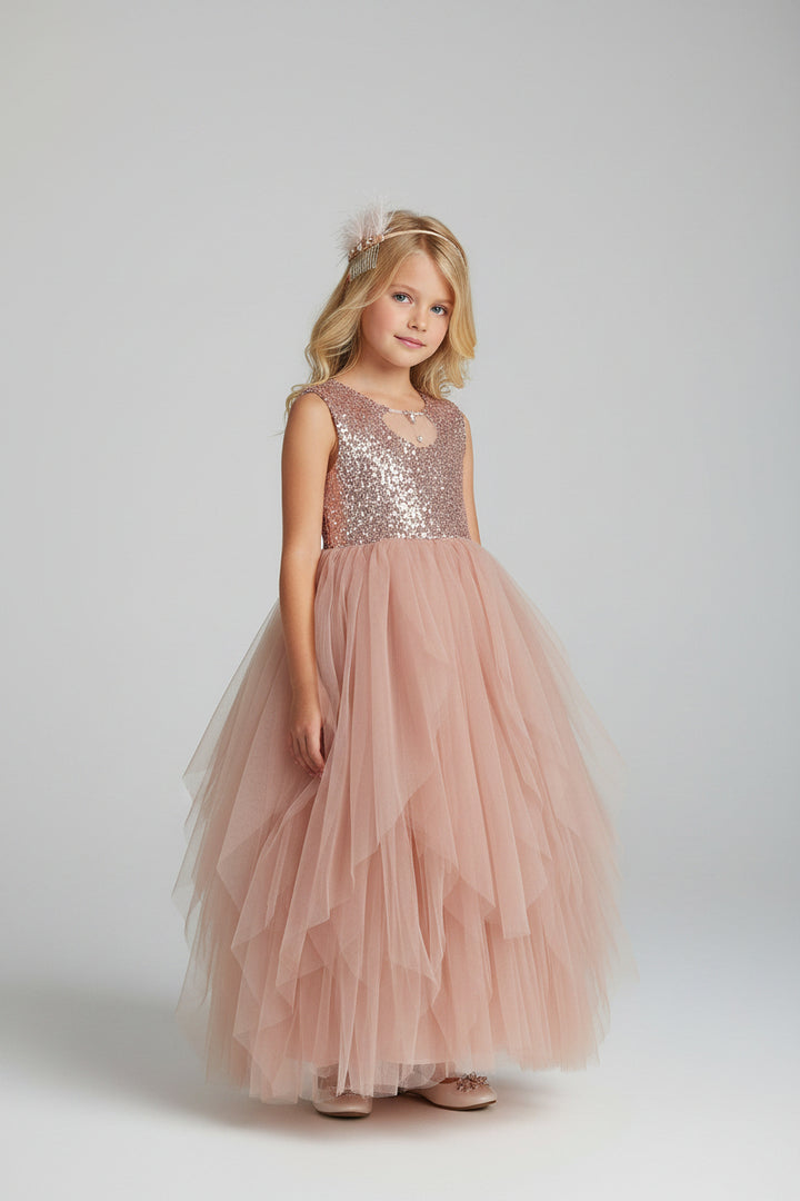 Étoile Grace sequin flower girl dress in blush with layered floor-length tulle skirt, front view on model by Mia Bambina Boutique