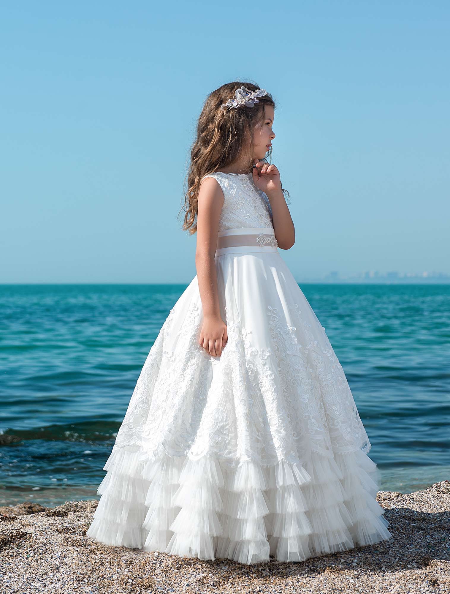 Side view of elegant flower girl dress size 9-10 with lace top and tulle skirt