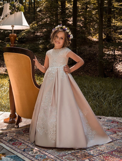 Young girl in Juliana Satin and Lace Flower Girl Dress standing outdoors with trees in the background