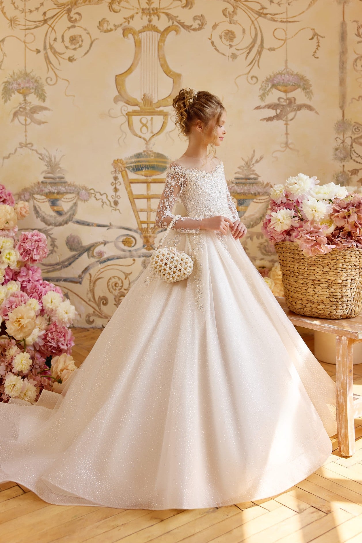 Luxury pearl beaded First Communion dress for girls with glitter tulle ball gown skirt and long illusion sleeves - Mia Bambina Boutique