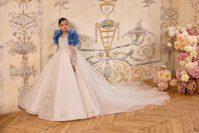 Full-length gown with detachable blue floral cape for weddings