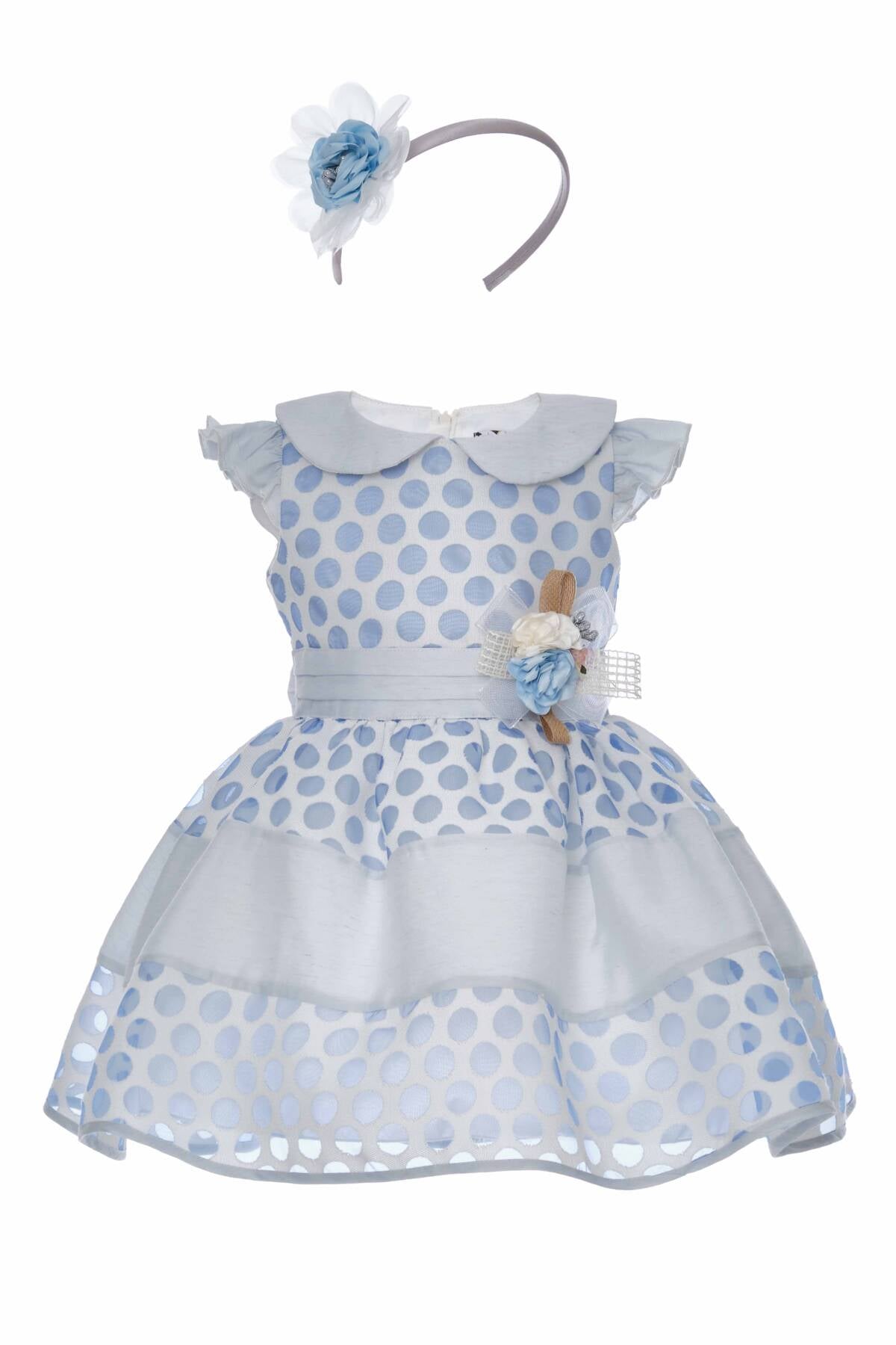 Blue polka dot baby girl party dress laid flat, front view, with matching light blue flower headband by Mia Bambina Boutique Canada