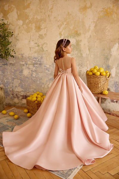 Back view of blush pink ball gown with lace-up corset detail