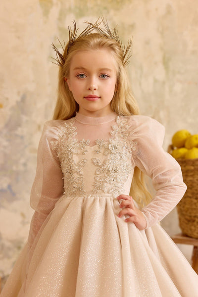 Close-up of champagne gold flower girl gown with embroidered bodice