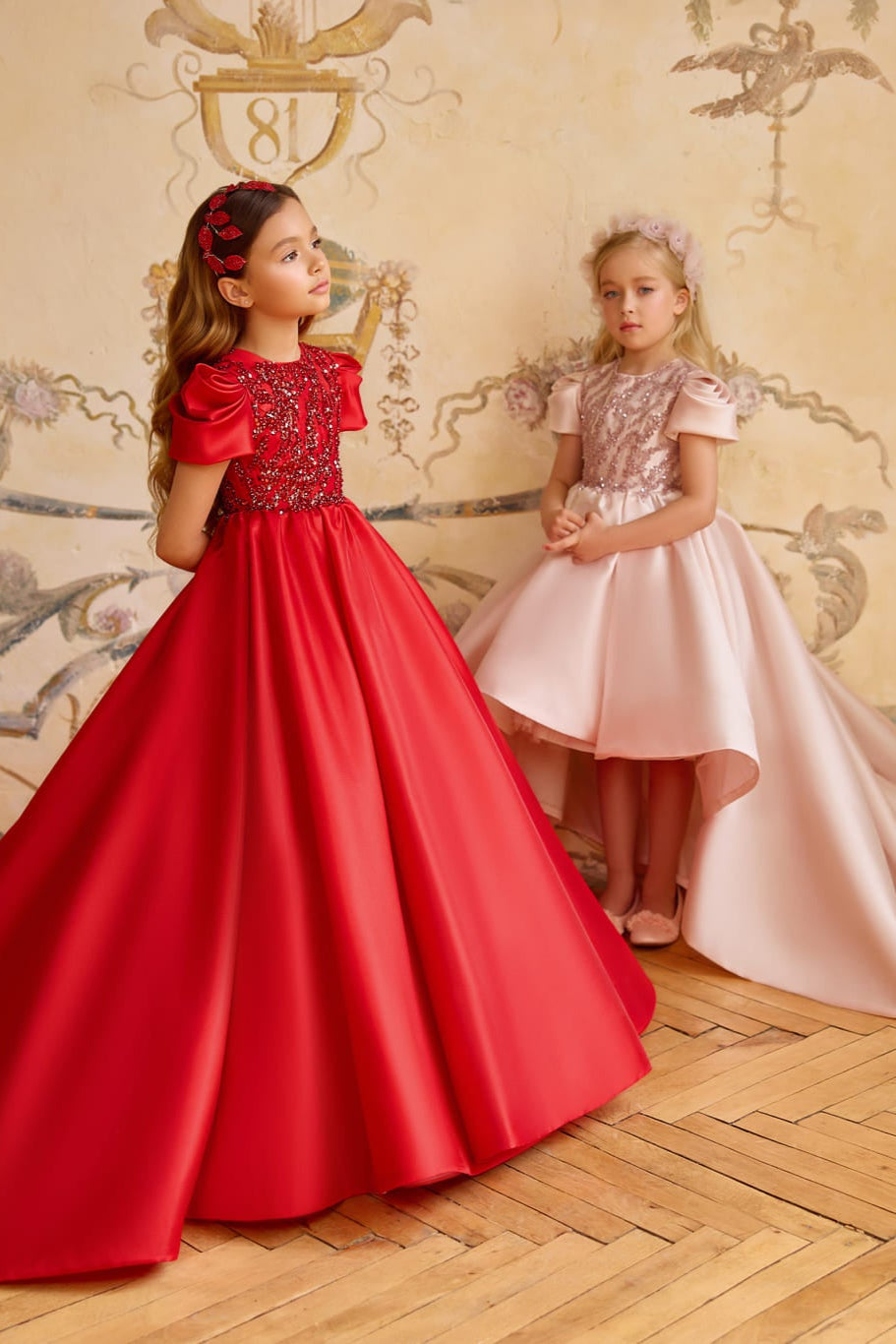 Girl in red long gown with sequin bodice and puff sleeves