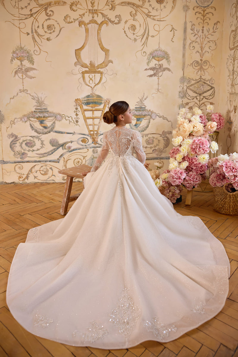 Back view of ivory communion gown with cathedral train
