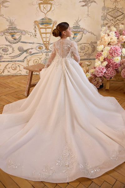 Back view of ivory communion gown with cathedral train