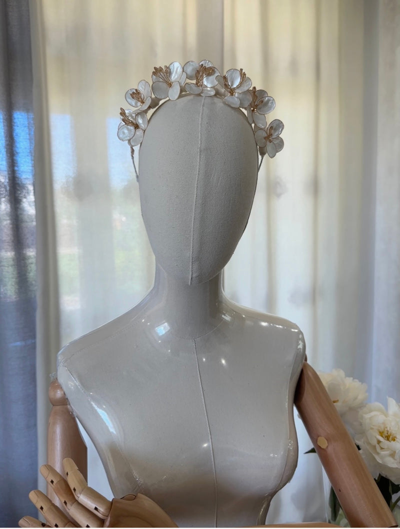 Handmade ivory flower crown headband with mother-of-pearl petals and golden accents for girls’ special occasions