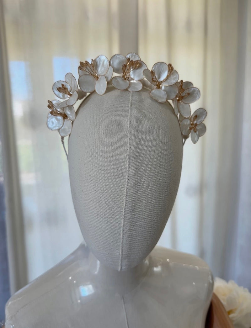 Handmade ivory flower crown headband with mother-of-pearl petals and golden accents for girls’ special occasions