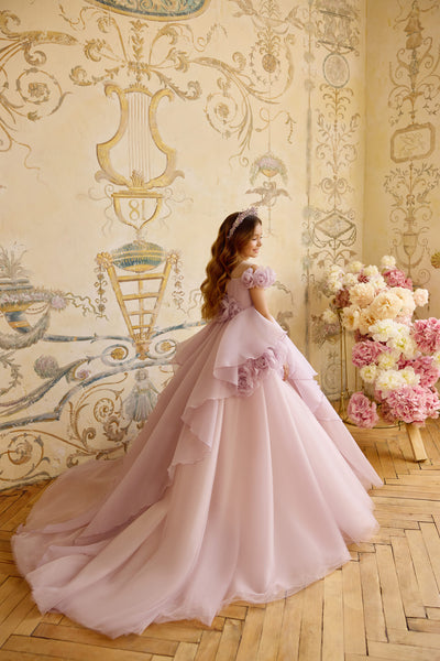 Back view of lilac princess gown with cascading floral accents