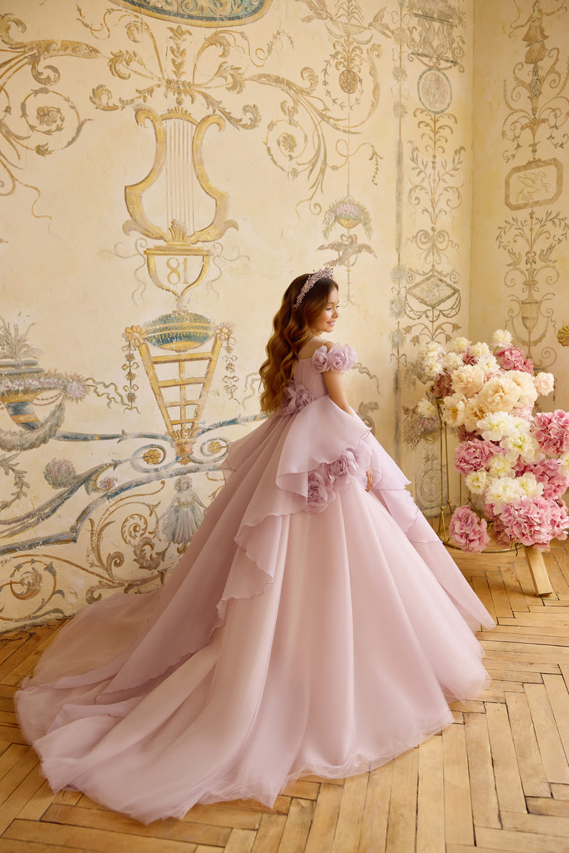 Back view of lilac princess gown with cascading floral accents