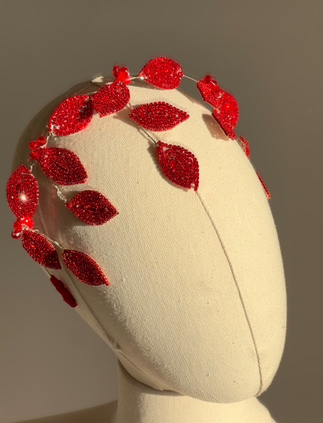 Red crystal leaf headband on mannequin – side view