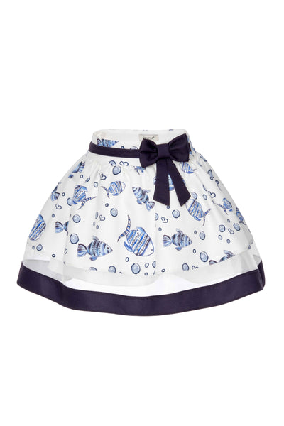 Skirt with blue fish pattern and navy belt on a white background