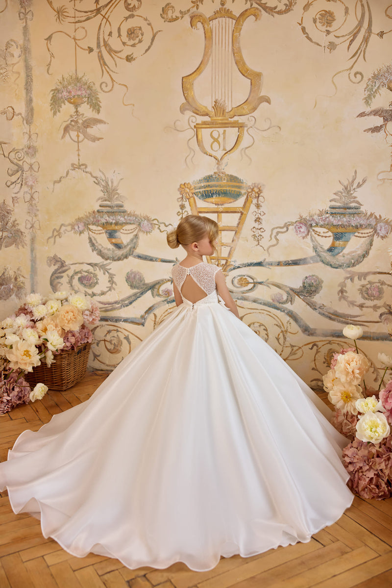 Back view of Communion dress with keyhole detail and full skirt