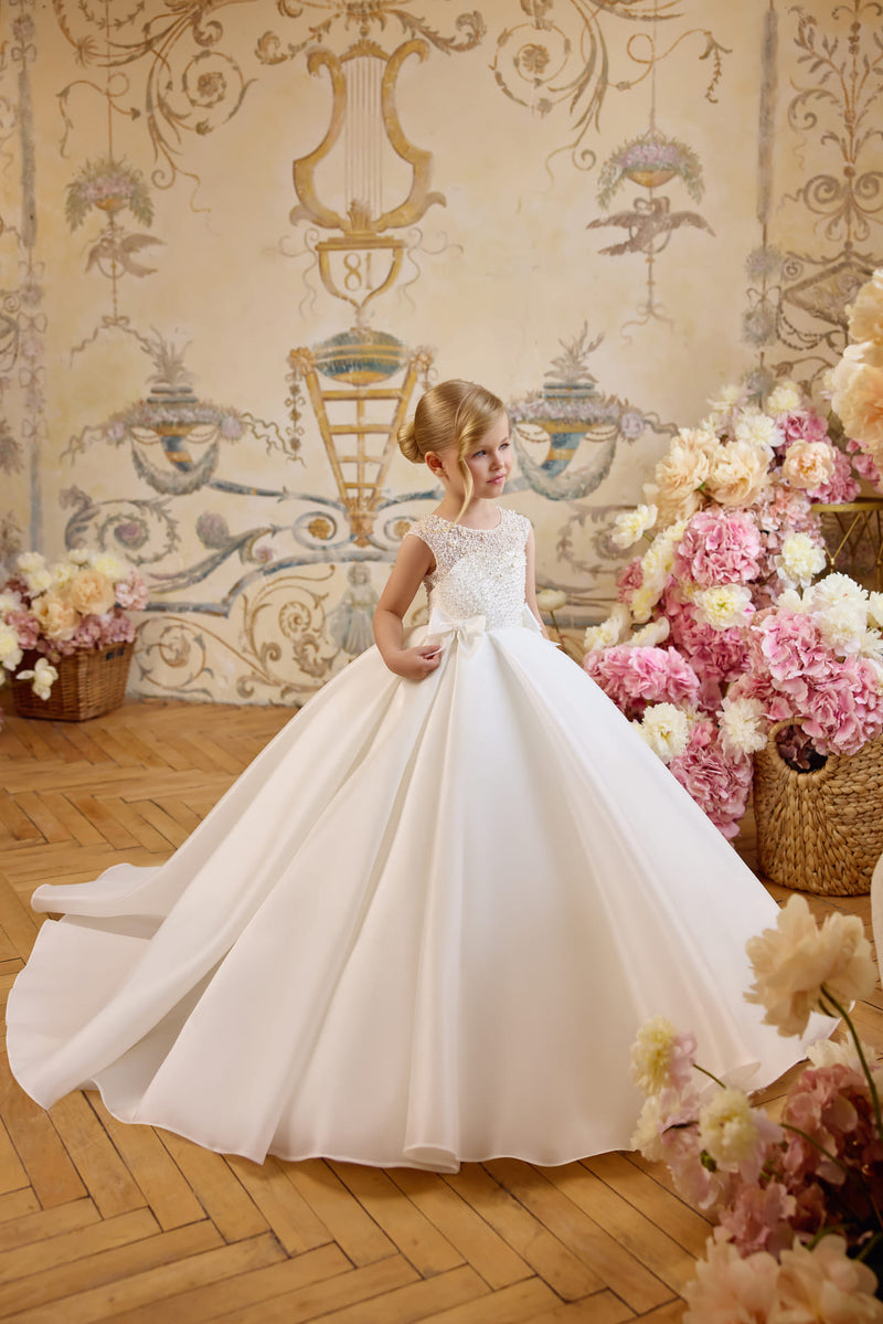 Elegant First Communion ball gown with pearls and satin bow