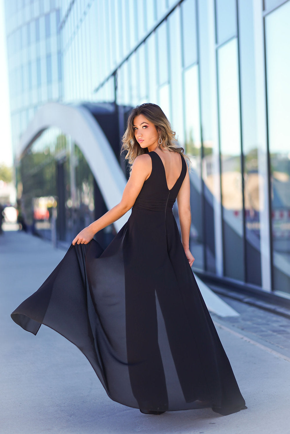 formal black jumpsuit featuring an overskirt Mia Bambina Boutique