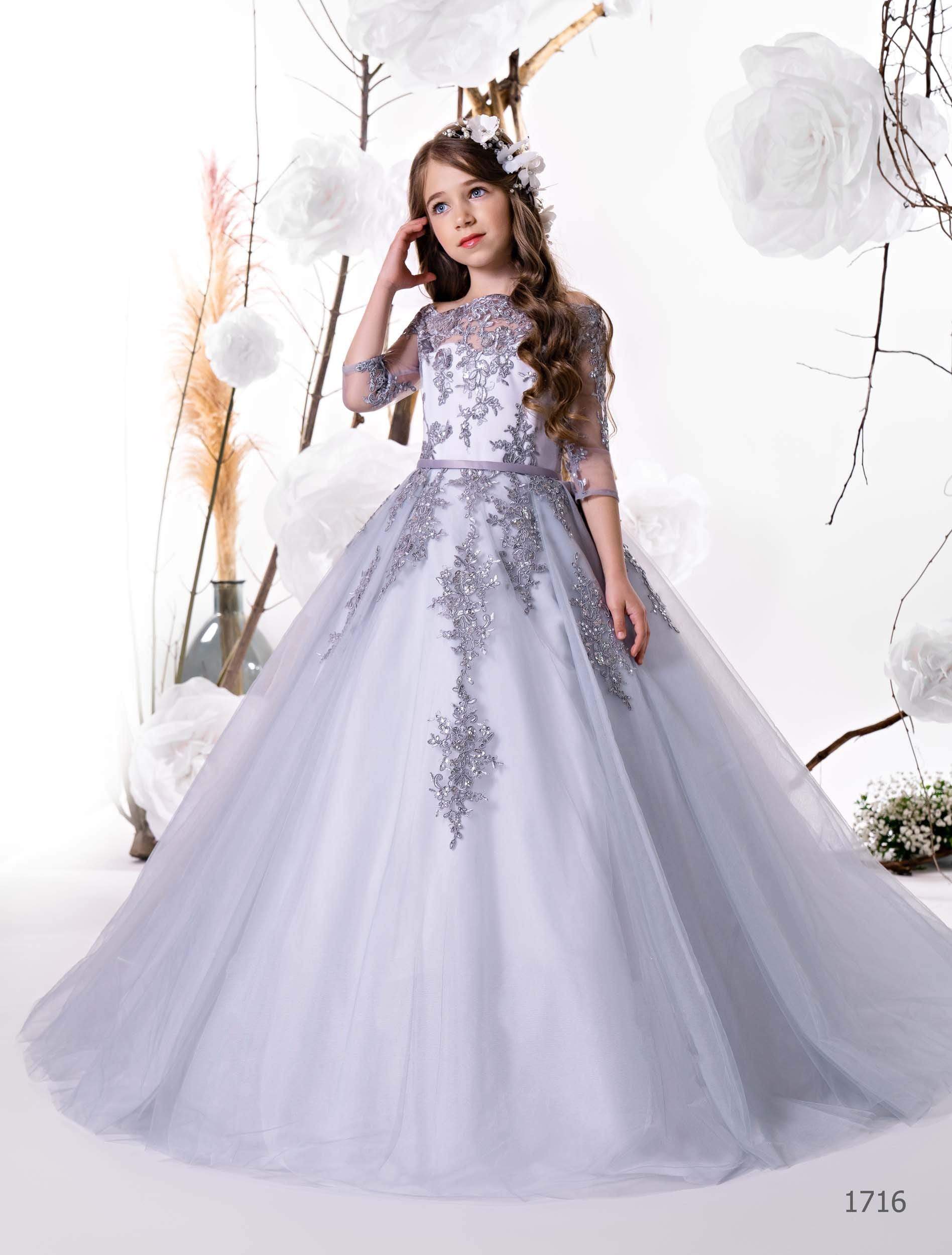 Flower girl dress in embroidered flower girl gown in soft grey colour – with long tulle skirts and sheer sleeves.