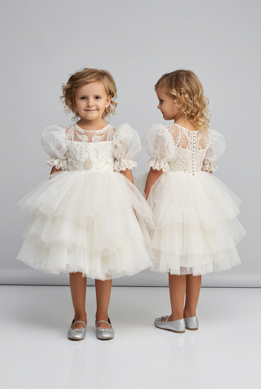Lavino ivory flower girl dress with puff sleeves and tiered tulle skirt, front and back view - Mia Bambina Boutique