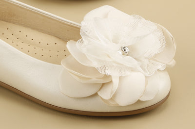White Leather Flats Communion Shoes with a Flower by Andanines Mia Bambina Boutique Canada